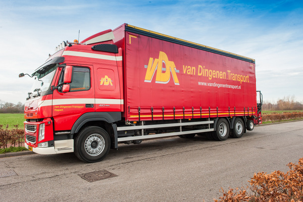 Foto van zijkant sneltransport busje VDT